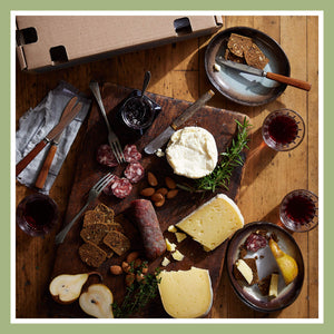 Charcuterie board with artisan cheeses, meats, and accompaniments