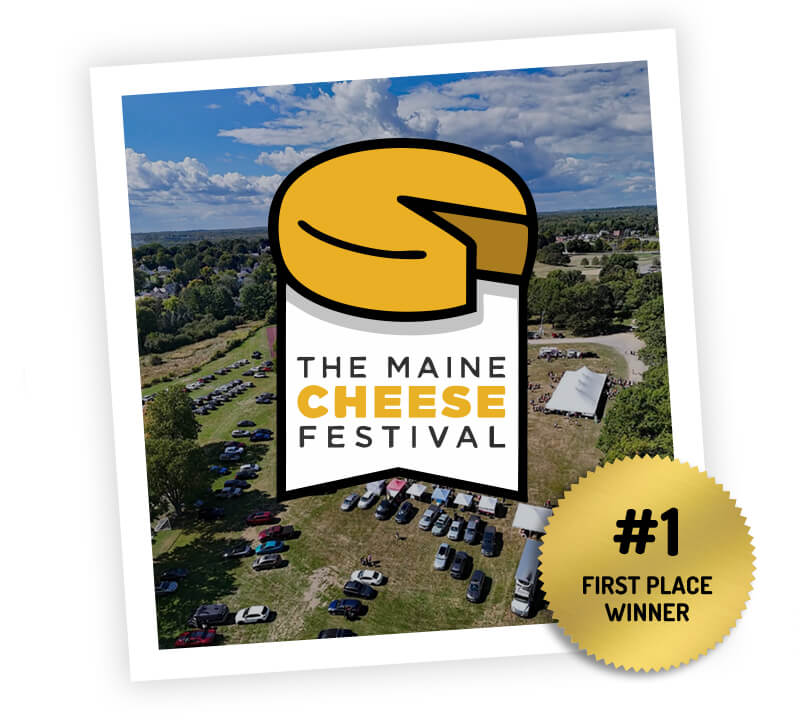 Maine Cheese Festival logo over an aerial festival photo with a first-place winner badge for Crooked Face Creamery’s Butterkäse.